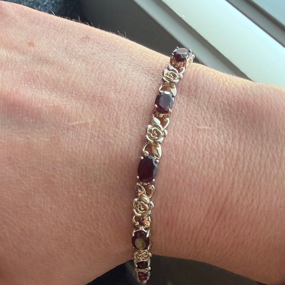 .925 Sterling Silver and Genuine Garnet Bracelet with rose accents